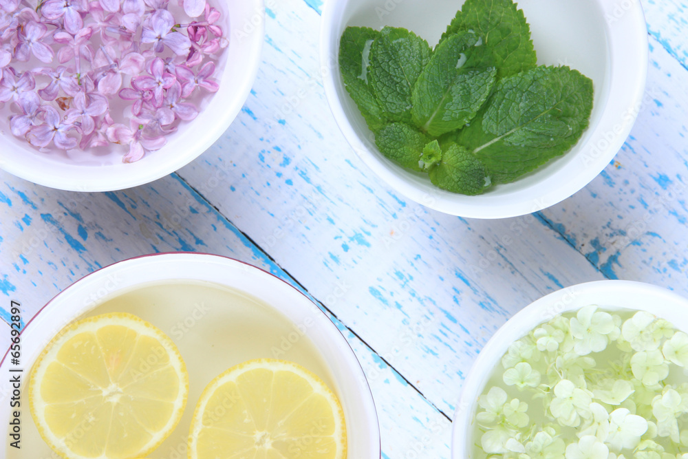 Aromatherapy treatment bowl with flowers and perfumed water Aromatherapy treatment bowl with flowers and perfumed water