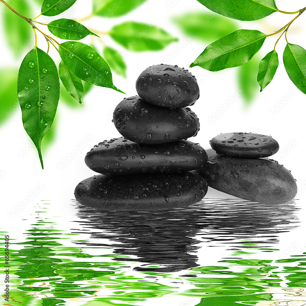 spa Background - black stones and bamboo on water spa Background - black stones and bamboo on water