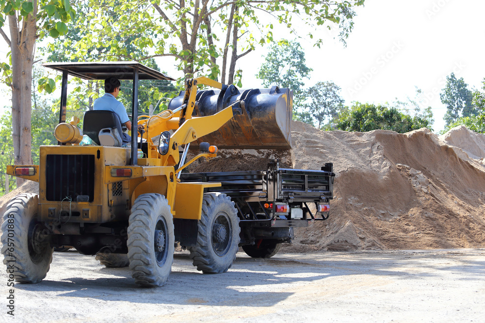 Tractor working in construction site Tractor working in construction site