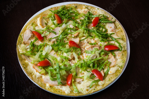Appetizing pizza with meat of chicken