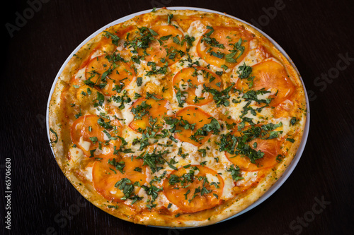 Appetizing pizza with tomatoes