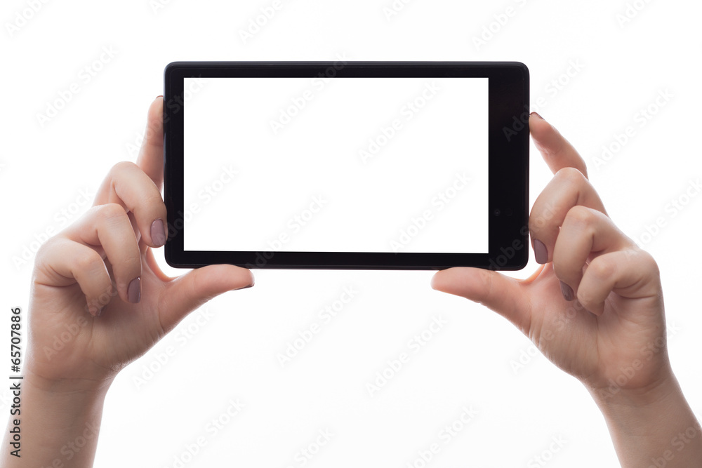 Woman hold tablet PC on white