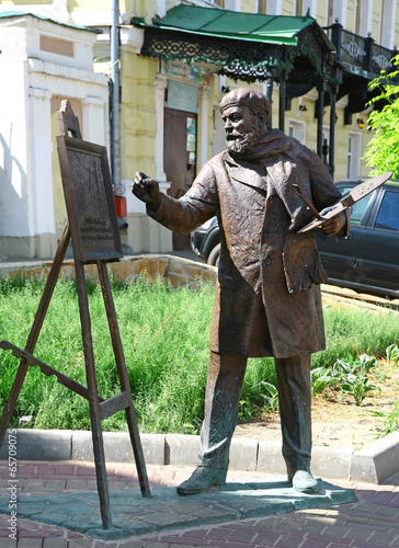 Sculpture artist Konstantin Makovsky with easel for painting wor photo