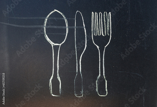 cutlery drawn with chalk on blackboard