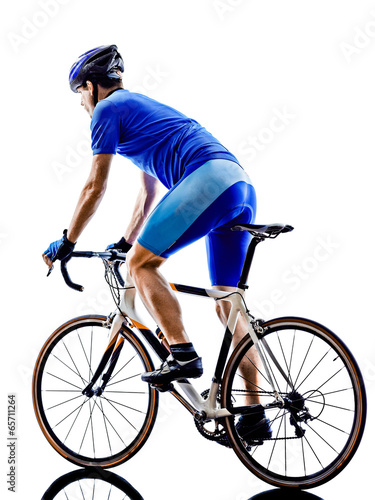 Fototapeta Naklejka Na Ścianę i Meble -  cyclist cycling road bicycle rear view silhouette