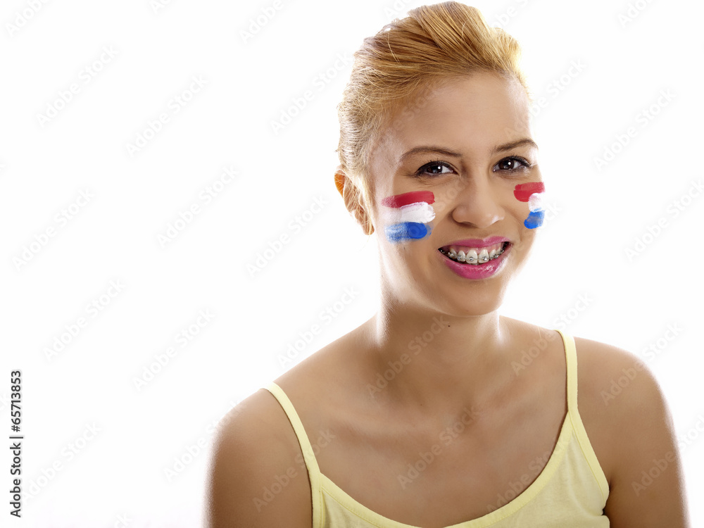 smiling girl with dutch flag painted on her face smiling girl with dutch flag painted on her face