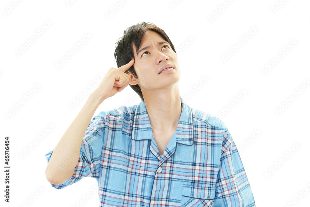 頭痛を訴える男性