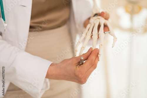 Closeup on medical doctor woman teaching anatomy 
