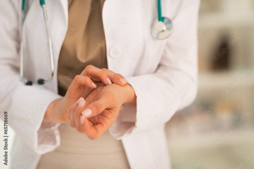 Medical doctor woman measuring pulse Medical doctor woman measuring pulse