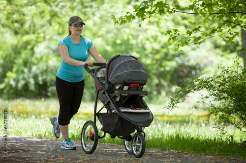 Young woman with a stroller
