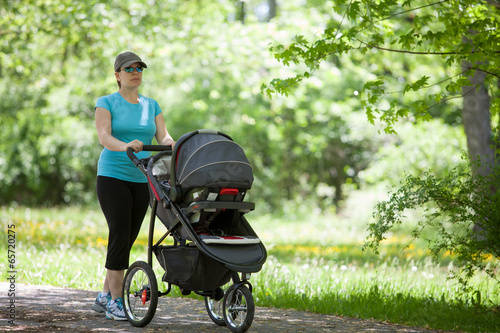 Young woman with a stroller