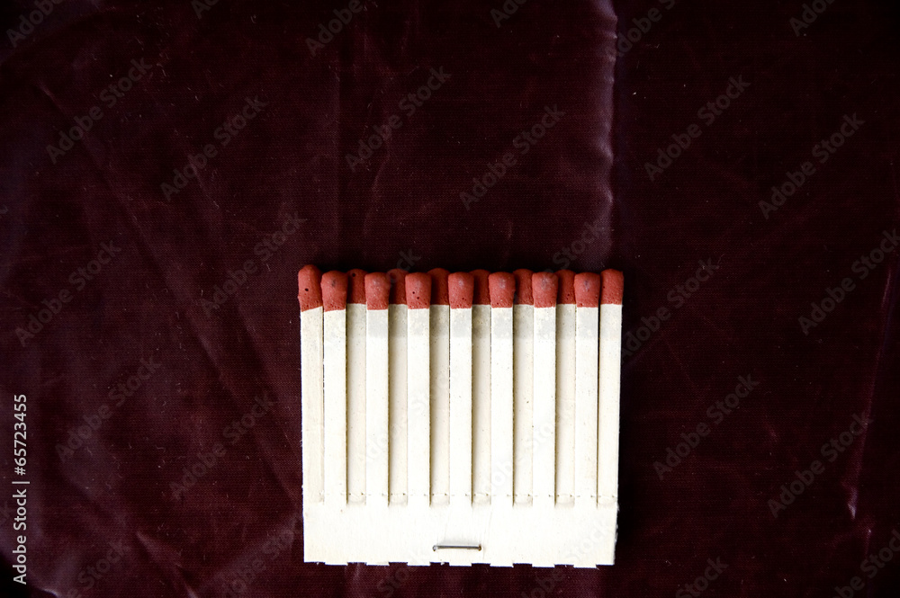 matches row on deep red background matches row on deep red background