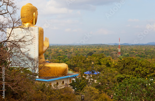 Big Gold Buddha statue. Golden Temple, Dambulla, Sri Lanka
