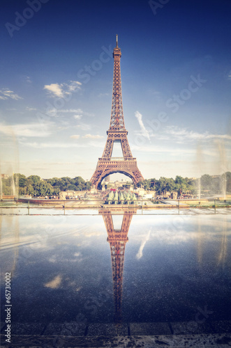 Scenic view of the Eiffel Tower reflected in water