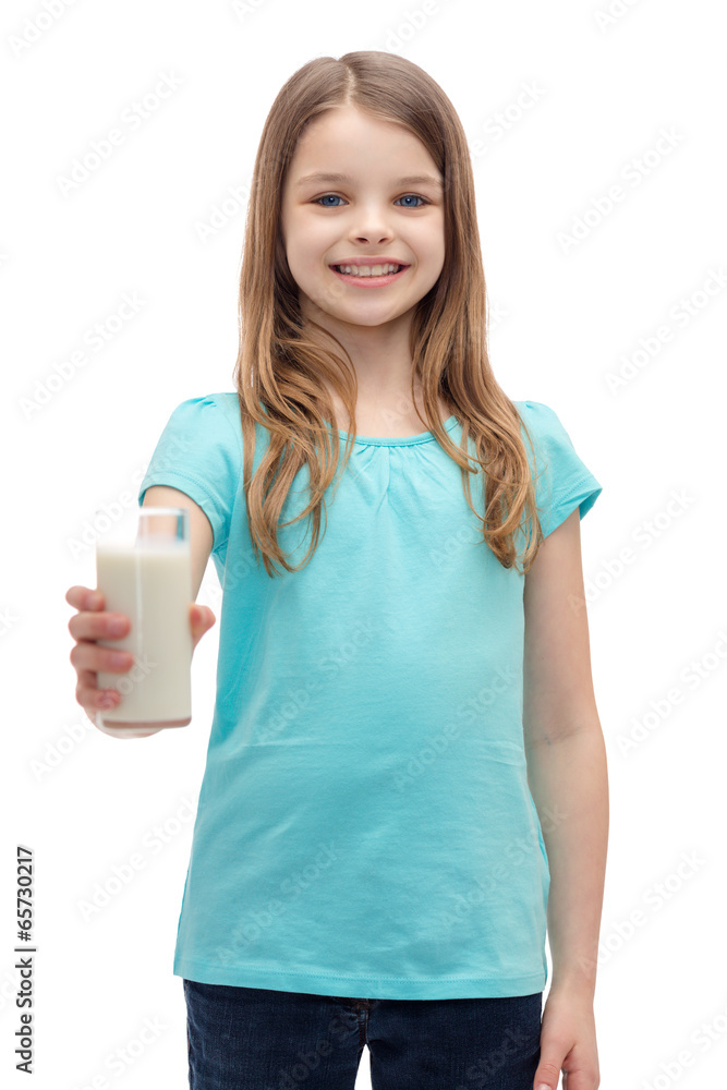 smiling little girl giving glass of milk smiling little girl giving glass of milk