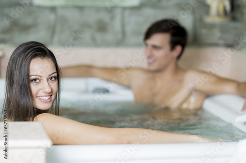 Young couple relaxing in th...