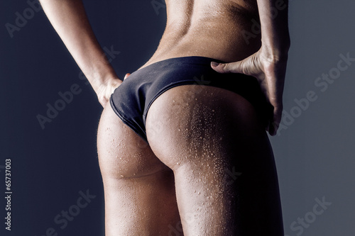 female athlete rear view, trained buttocks