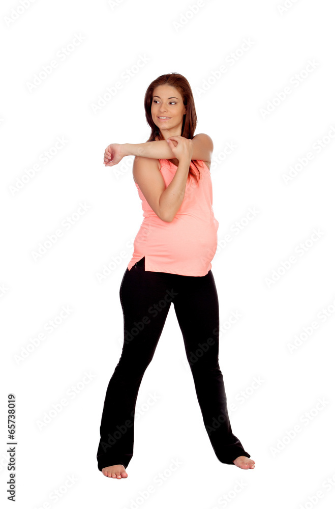 Beautiful pregnant woman doing stretching Beautiful pregnant woman doing stretching