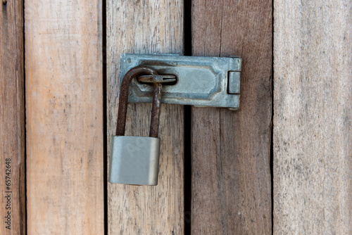 фотографія Close up of padlock and old metal hasp
