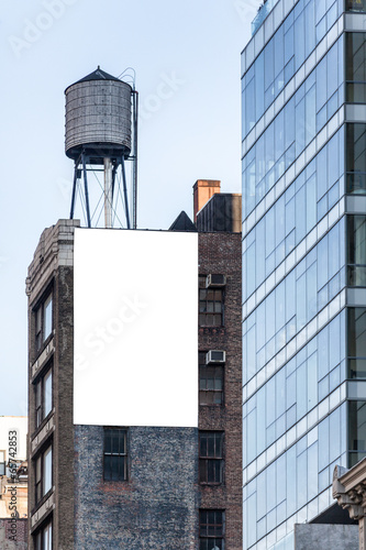 Big white billboard on the wall.