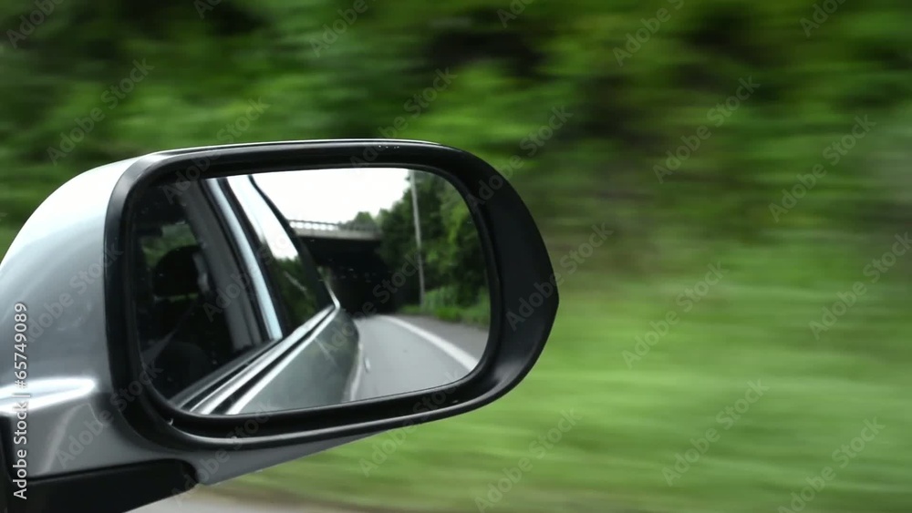 ride in the car - reflection in the rearview mirror ride in the car - reflection in the rearview mirror