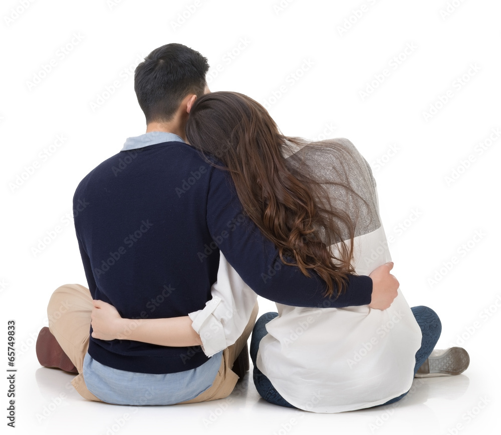 Asian couple sit on ground Asian couple sit on ground