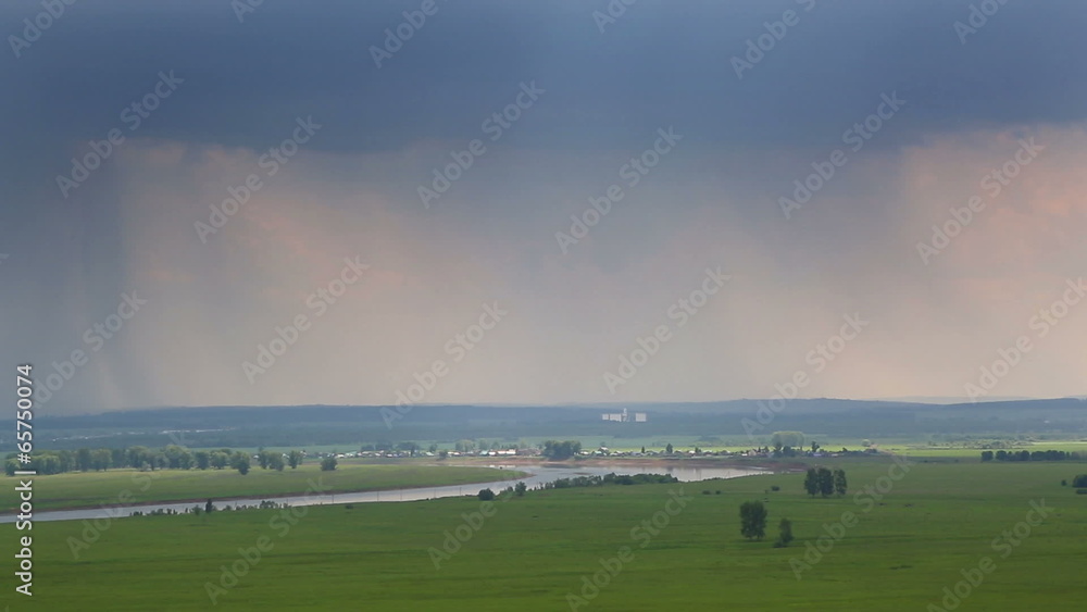 timelapse landscape with clouds and rain on horizon - view from timelapse landscape with clouds and rain on horizon - view from