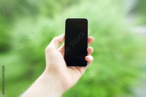Mobiltelefon in der Hand