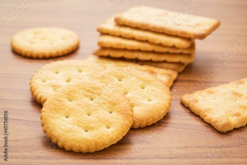 Crackers on wooden background