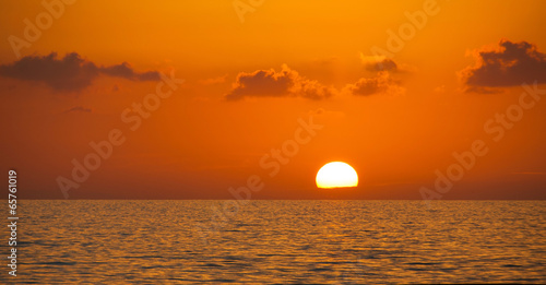 Fototapeta Naklejka Na Ścianę i Meble -  Fabulous sunset on a background of sky and sea.