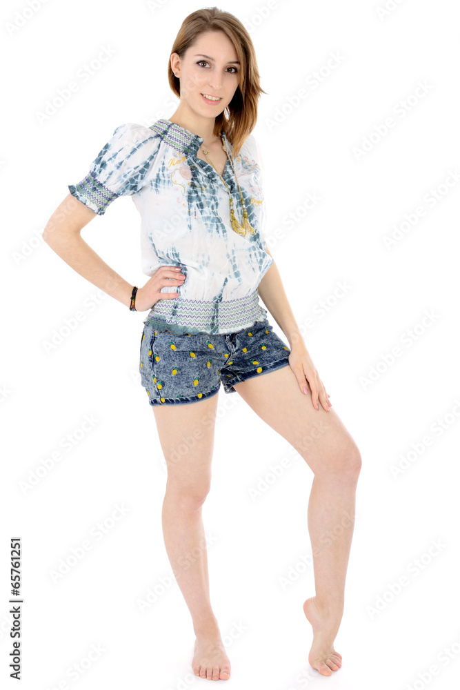 Teenager in Hot Pants und Bluse Stock-Foto | Adobe Stock