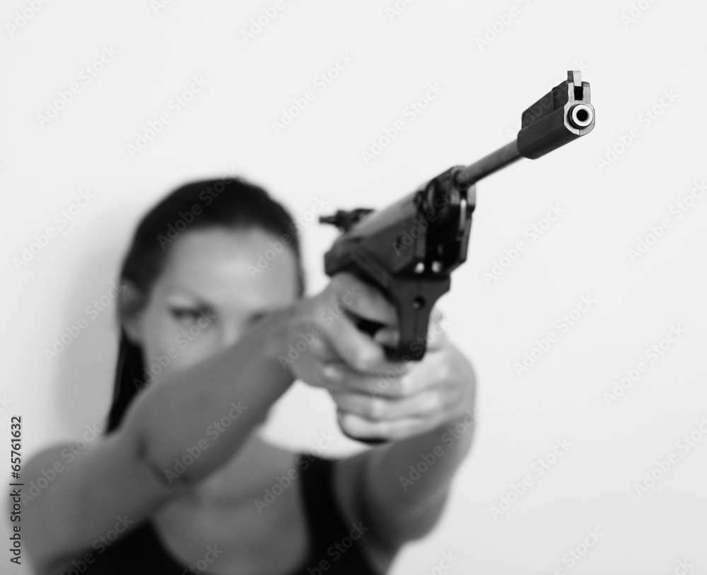 Woman with gun, self-defense (The carrying and use of weapons) Woman with gun, self-defense (The carrying and use of weapons)