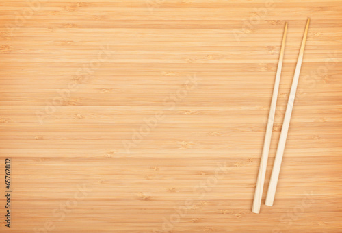 Sushi chopsticks on bamboo table