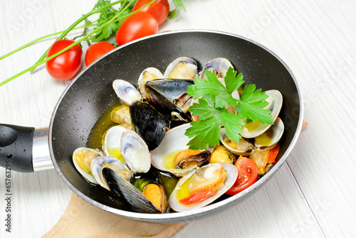 sea fruit fried in the pan photo