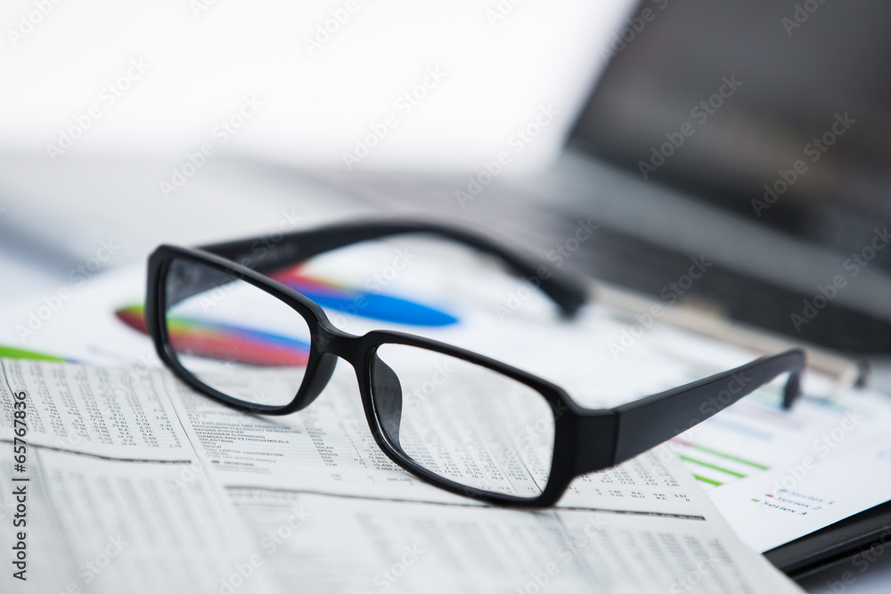 Businessman analyzing investment charts with laptop Businessman analyzing investment charts with laptop