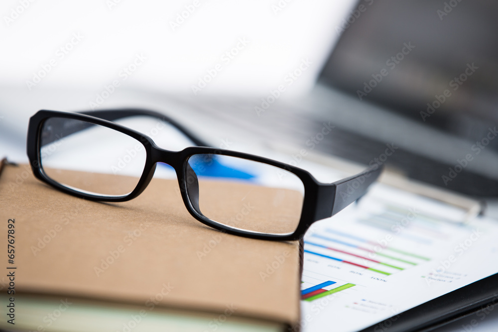 Businessman analyzing investment charts with laptop Businessman analyzing investment charts with laptop