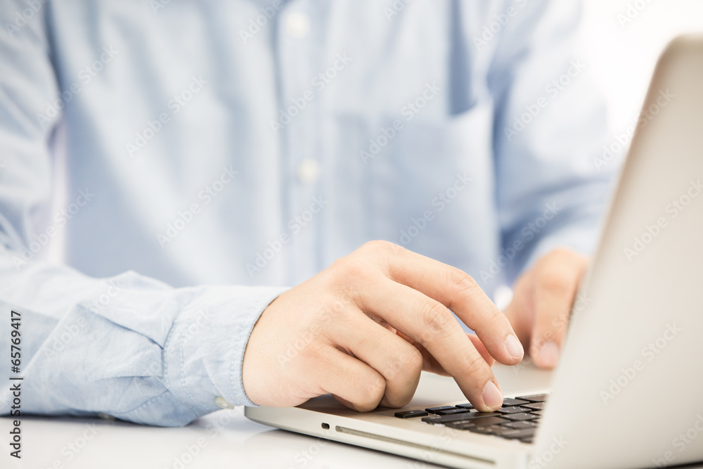 Close-up of Businessman using laptop Close-up of Businessman using laptop