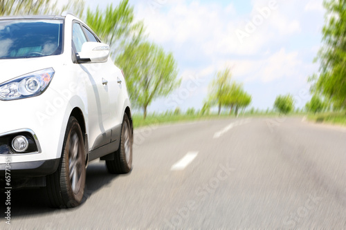 Very fast driving car on road © Africa Studio