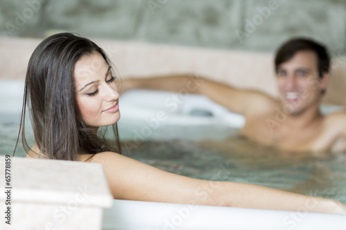 Young couple relaxing in th...