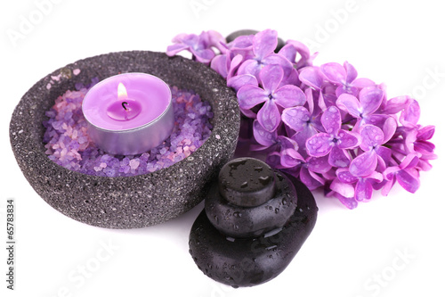 Composition with spa stones and lilac flowers  isolated on