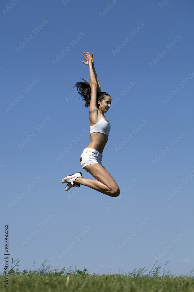 Fitness woman exercising in summer park Fitness woman exercising in summer park