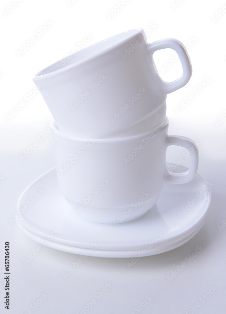 Set of white dishes isolated on white Set of white dishes isolated on white