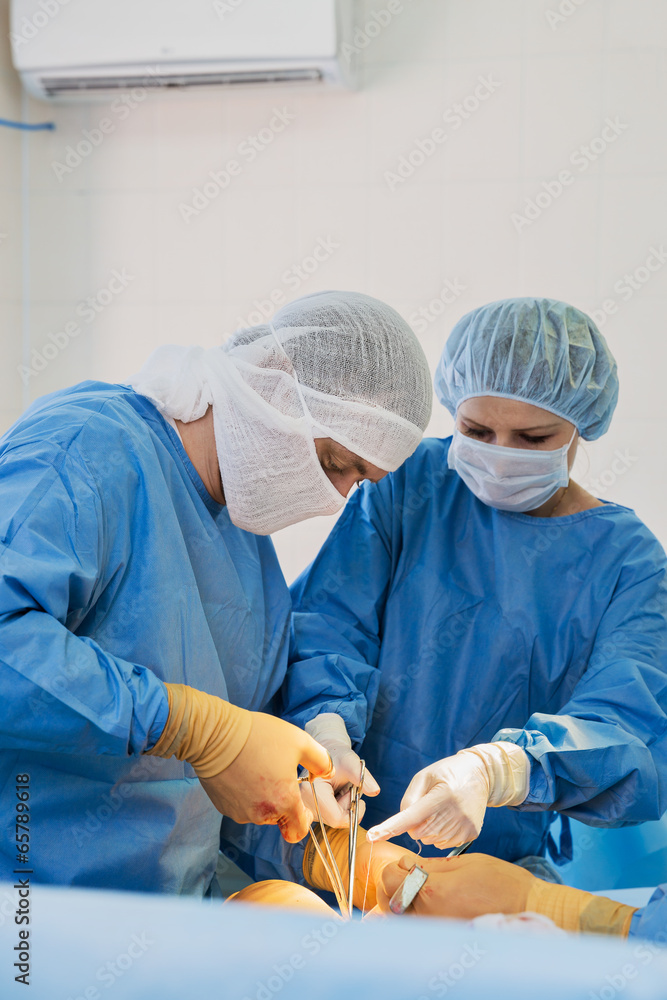 Surgeons in operating room Surgeons in operating room