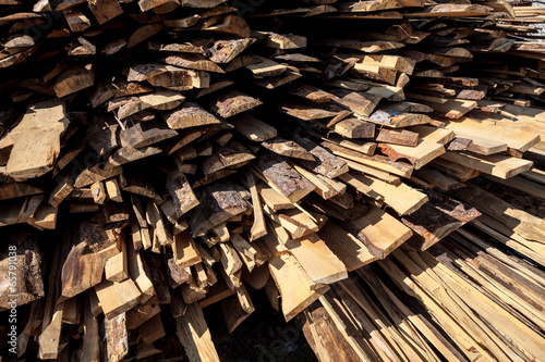 Pile of raw planks of pine wood