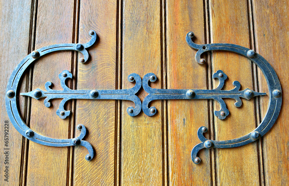 Gothic style wooden door of church in Belgium. Gothic style wooden door of church in Belgium.