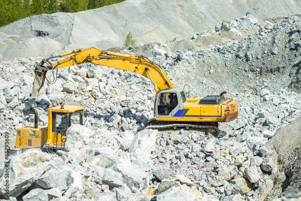 Excavators digging Excavators digging