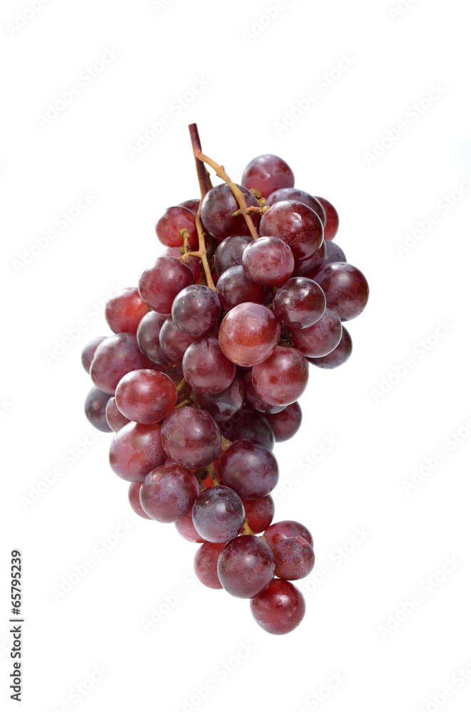 Fresh red grapes isolated on white background. Fresh red grapes isolated on white background.