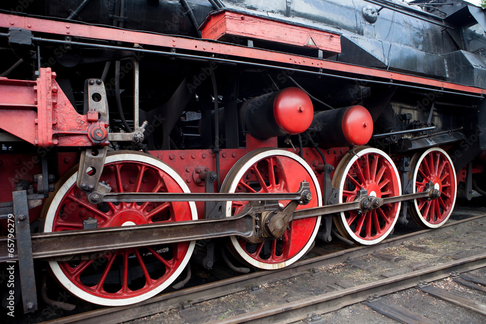 Red wheel on a steam train locomotive