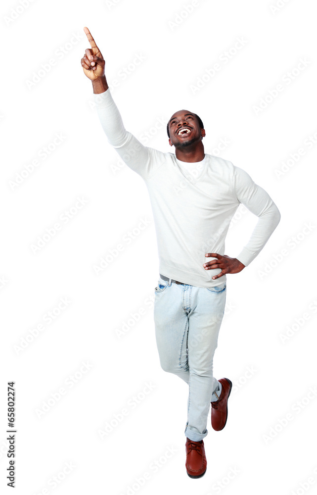 Laughing african man showing up on white background Laughing african man showing up on white background