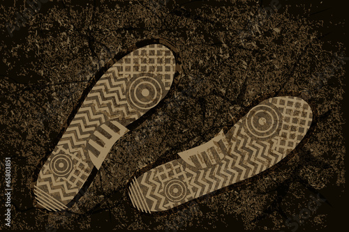 Footprint on the earth. Grungy background